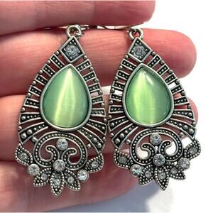 Pierced earrings ornate Silvertone teardrops green moonstone centers drop dangle